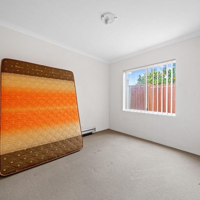 Stylish & Easy Living in a Private Rear Villa - Photo 1