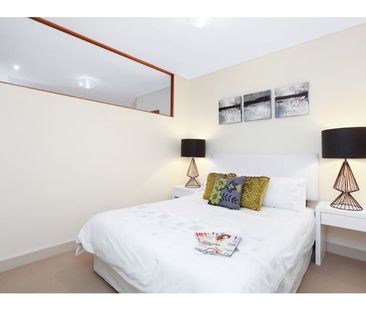 Stylish Two Bedroom Unit in the "Chocolate Factory" with Parking - Photo 3