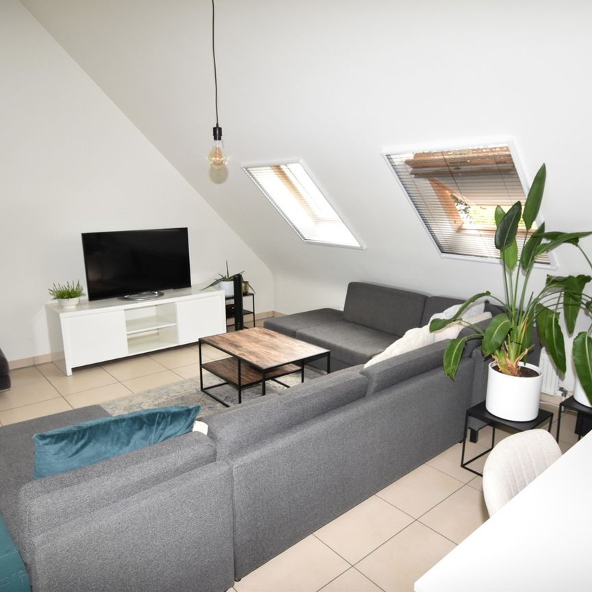 Gezellig dakapp. van 85m², met terras van 60m² (!) & garage - foto 1