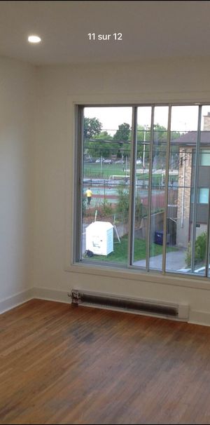 Grand 5 1/2 Haut Triplex - Photo 1