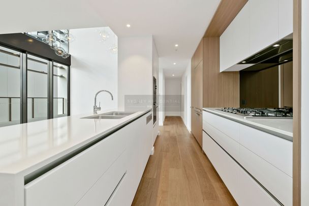 Split Level Penthouse Located in Barker House with Two Car spaces - Photo 1