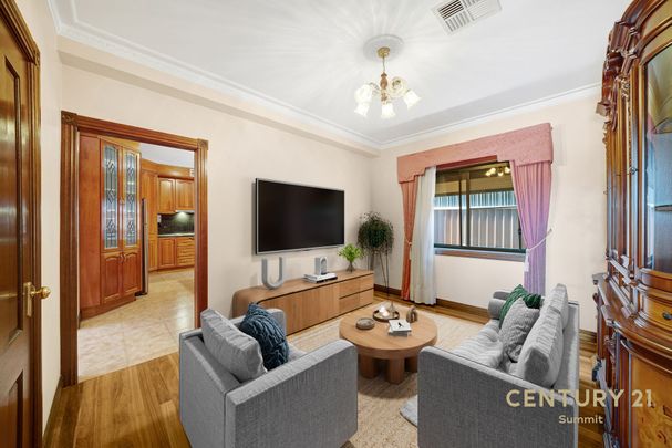 Stylish 4-Bedroom Home with Huge Garage and Family-Friendly Backyard - Photo 1