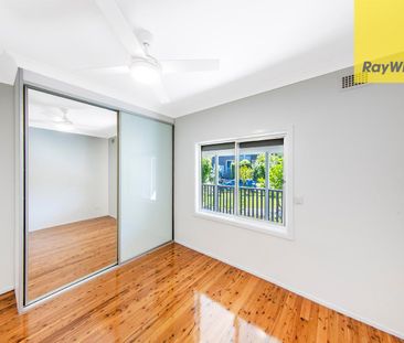 Stunningly Renovated 5-Bedroom Family Oasis with Pool and Garage! - Photo 5