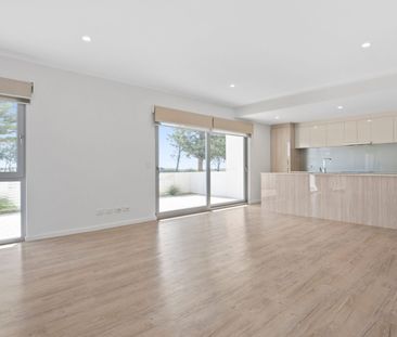 Stylish Apartment in the Perfect Location! - Photo 1