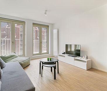 Modern en ruim tweeslaapkamer appartement met autostaanplaats in Antwerpen! - Photo 1