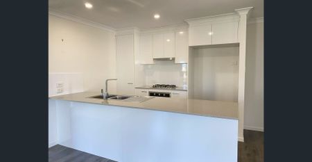 Modern 4-Bedroom Family Home in the Heart of Pimpama - Photo 4