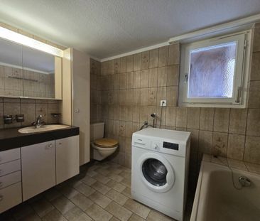 Appartement de 2,5 pièces au rez-de-chaussée - Photo 3