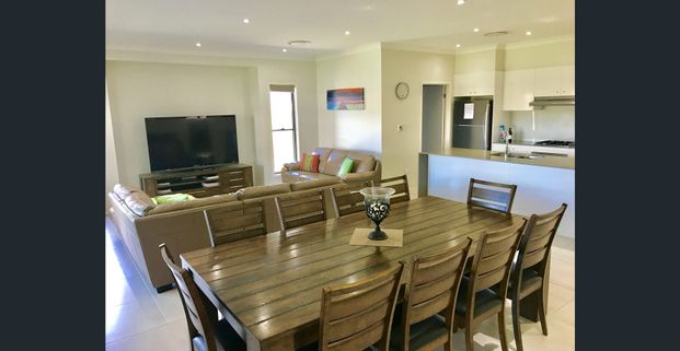 COASTAL EXCELLENCE IN BAYSWOOD- Fully Furnished - Photo 1