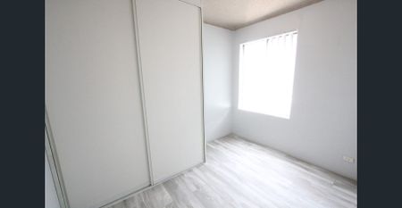 IMMACULATE 1ST FLOOR APARTMENT CLOSE TO ALL AMENITIES - Photo 3