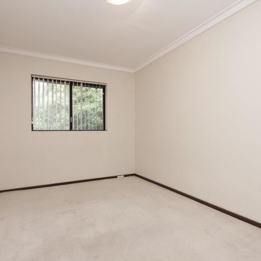 COMFORT AND CONVENIENCE AWAIT! - Photo 1