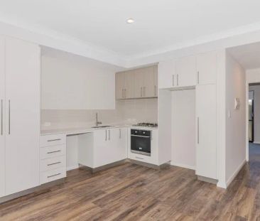 Apartment Living Close to the Beach! - Photo 1