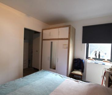 GELIJKVLOERS APPARTEMENT MET 2 TERRASSEN EN AUTOSTAANPLAATS - Photo 1