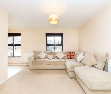 A two bedroom apartment within a small gated development just off H... - Photo 3
