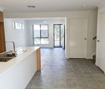 AVAILABLE 1/04/26- 3 BED 2 BATH TOWNHOUSE WITH DUCTED AIR - Photo 1