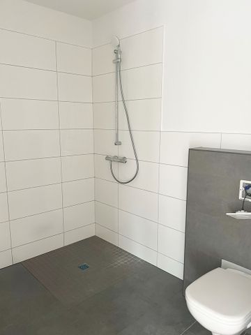 Neubau-Erstbezug! 2-Zimmer Wohnung mit ca. 61m² im 1. Obergeschoss in Wardenburg! - Photo 5