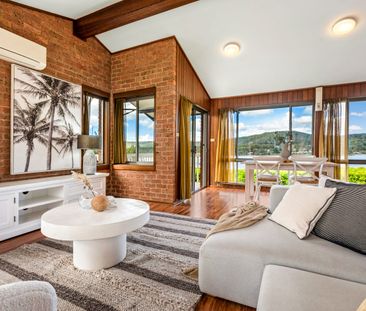 Waterfront Family Living with Tranquil Views & Spacious Split-Level... - Photo 2