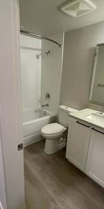 Bright Junior 2BR/2BA/In suite laundry/SS appliances/Vinyl flooring - Photo 4