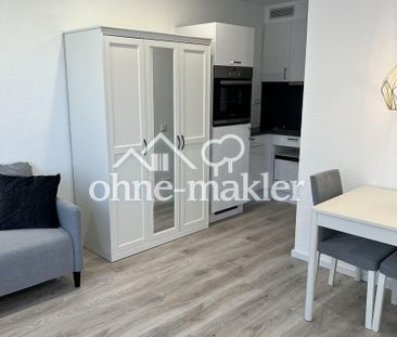 Moderne vollmöblierte 1-Zimmerwohnung mit Blick in die Stadt - Foto 1