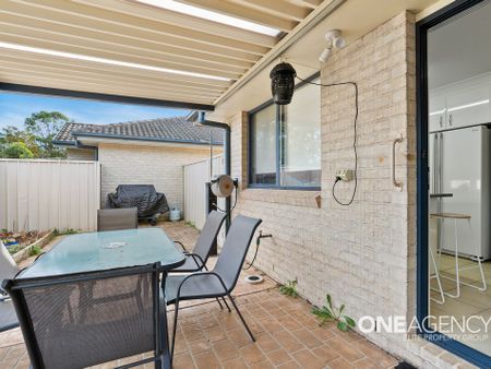 FULLY FURNISHED COASTAL LIVING: MODERN COMFORT IN A PRIME VINCENTIA SETTING - Photo 5