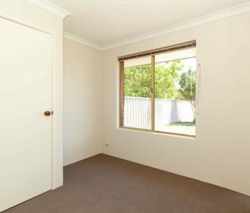 Spacious Family Home with Workshop & Multiple Living Areas - Photo 6