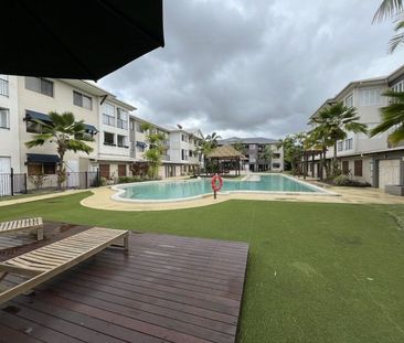 Furnished 2 Bed, 2 Bath Apartment in Resort-Style Complex - Photo 2