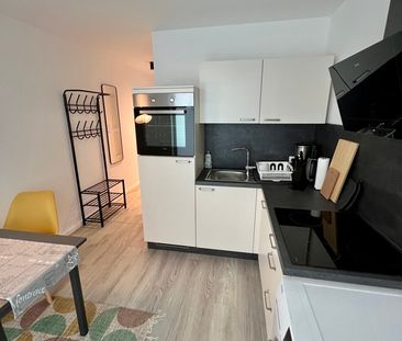 Exklusives Apartment mit Terrasse in zental gelegenem Neubau - Foto 1