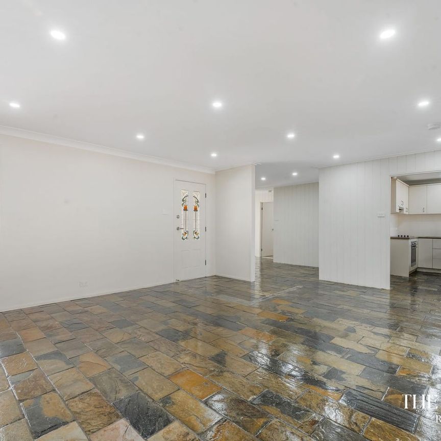 Spacious Family Living in Prime Bossley Park Location - Photo 1