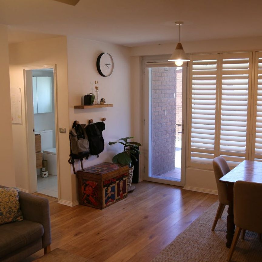 North-facing, Sun-Drenched, Renovated in Convenient Location - Photo 1