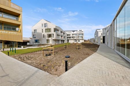 PRACHTIG NIEUWBOUW APPARTEMENT MET ONDERGRONDSE STAANPLAATS VLAKBIJ HET CENTRUM VAN SINT-TRUIDEN - Photo 4