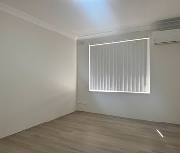 RENOVATED 3 BEDROOM TOWNHOUSE - Photo 5