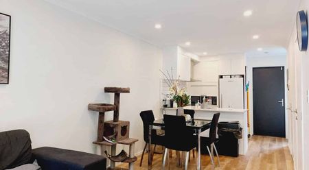 Stylish 2-Bedroom Home with Modern Comforts & Private Outdoor Spaces - Photo 5