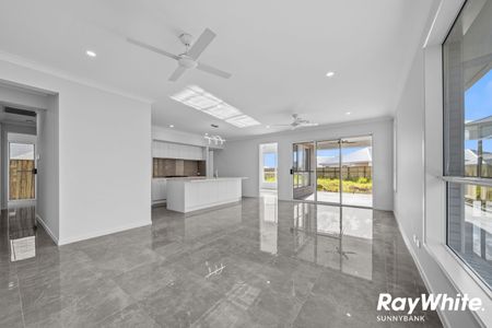 Brand New Home with Ducted Aircon and Large Backyard - Photo 2