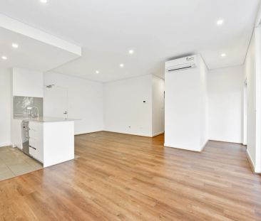 Ultra modern two bedroom apartment in convenient Homebush location - Photo 1