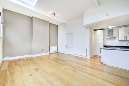 Contemporary first floor flat located in the heart of Knightsbridge refurbished to a high standard throughout with bright open plan reception room, 2 bedrooms and 2 bathrooms. - Photo 2