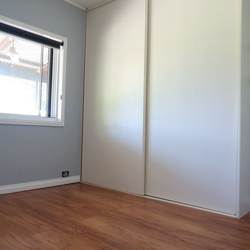 Beautifully Renovated | Huge Yard with Tropical Landscaping - Photo 1