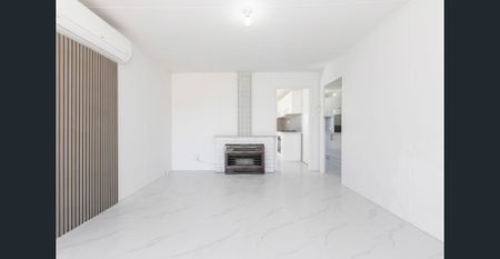 Renovated 3-Bedroom Home with Secure Garage - Photo 2