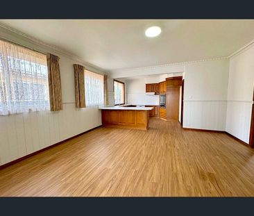 Spacious Family Home with Secure Yard and Ample Parking - Photo 3
