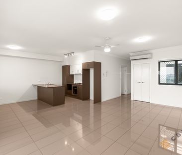 Stylish Inner-City Living with Oversized Balcony and Secure Parking! - Photo 1