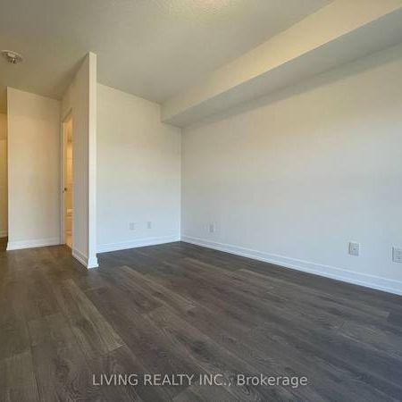 Feels brand new floor to ceiling windows + den! - Photo 1