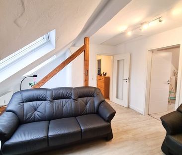 Gemütliche 2 Zimmer Dachgeschosswohnung in ruhiger Lage - Photo 1