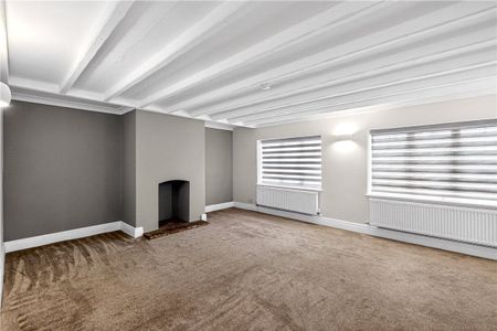 A detached farmhouse with a connected annexe, outbuildings (including stables) and three paddocks in Hanch. - Photo 2