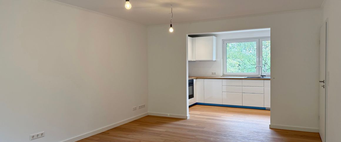 Erstbezug: Moderne & helle 3-Zimmer-Wohnung mit sonnigem Balkon + schöner Aussicht - Photo 1