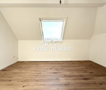 Moderne 1,5 Zi-Dachgeschosswohnung in einer Stadtvilla - Foto 4