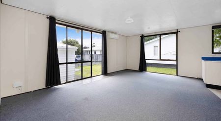 Comfortable 2-Bedroom Home - Photo 3