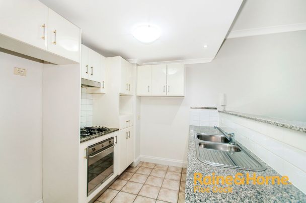 Conveniently Located Ground Floor Comfort with Amenities - Photo 1