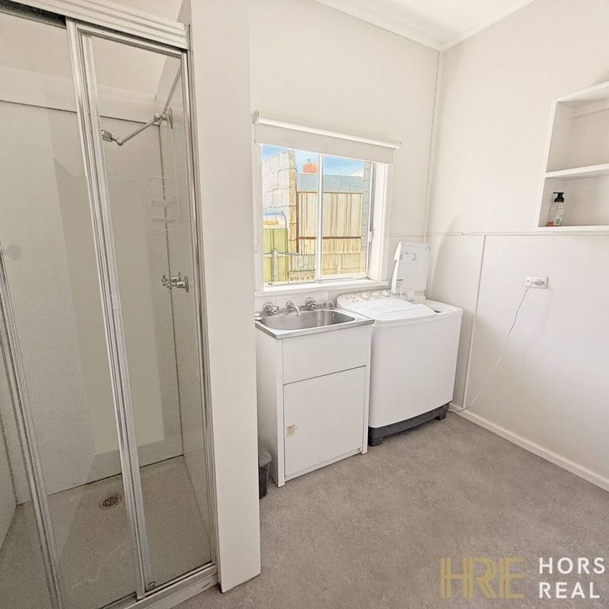 Modern Three-Bedroom Home Close to the CBD - Photo 1