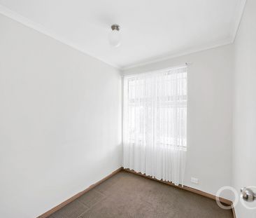 Open the Door to Comfortable Family Living in a Spacious Burton Home - Photo 5