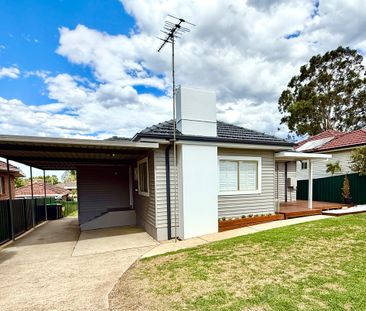 Fully Renovated Three-Bedroom Home with Carport Parking - Photo 2