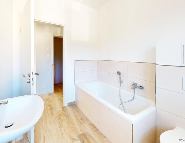 Neubau-Doppelhaushälfte mit durchdachtem Grundriss, Fußbodenheizung und großem Garten in Ottersleben - Foto 1