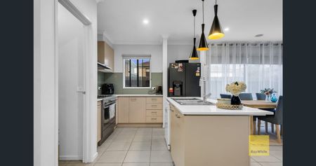 Charming 3-Bedroom Home with Modern Comforts and Single Garage - Photo 5